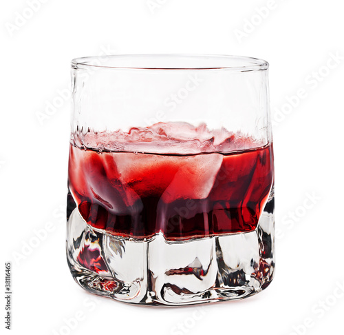 glass of alcoholic beverage on a white background