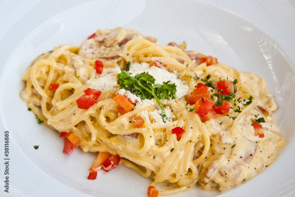 Spaghetti carbonara on white plate Spaghetti carbonara on white plate