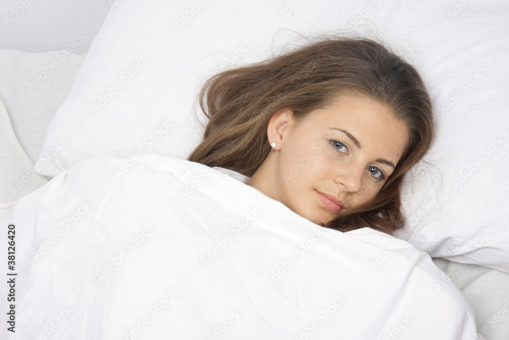young attractive woman in bed young attractive woman in bed