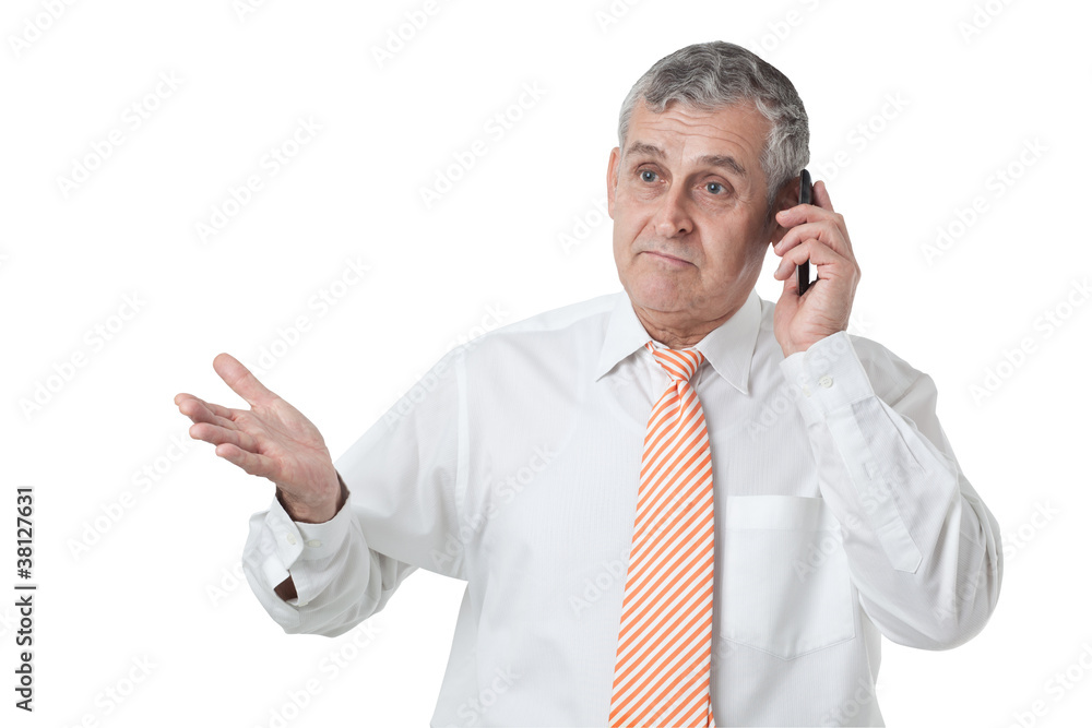 Portrait of an aged business man calling using mobile phone Portrait of an aged business man calling using mobile phone