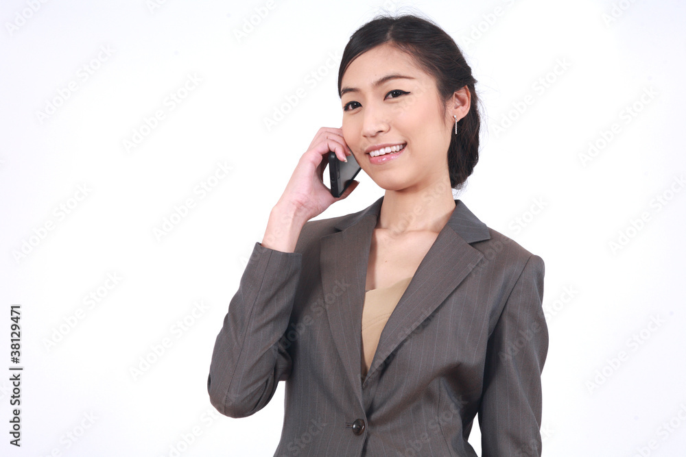 Asian Business woman talking on smart phone Asian Business woman talking on smart phone