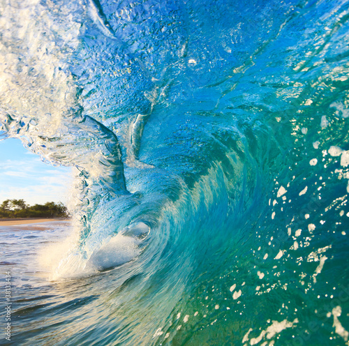 Fototapeta Naklejka Na Ścianę i Meble -  Breaking Ocean Wave Crashing over Camera