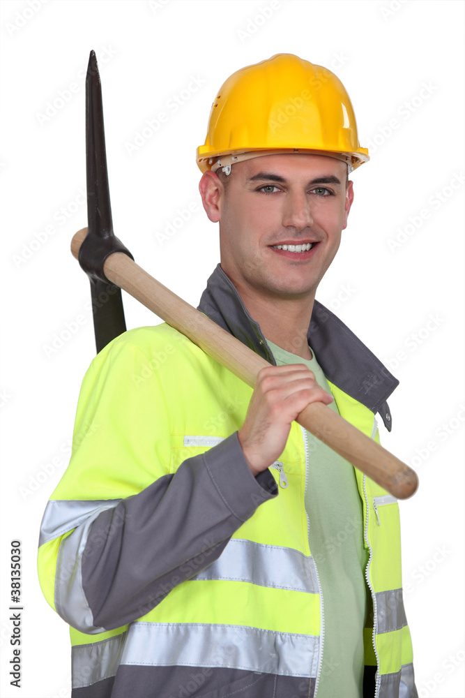 Tradesman carrying a pickaxe Tradesman carrying a pickaxe