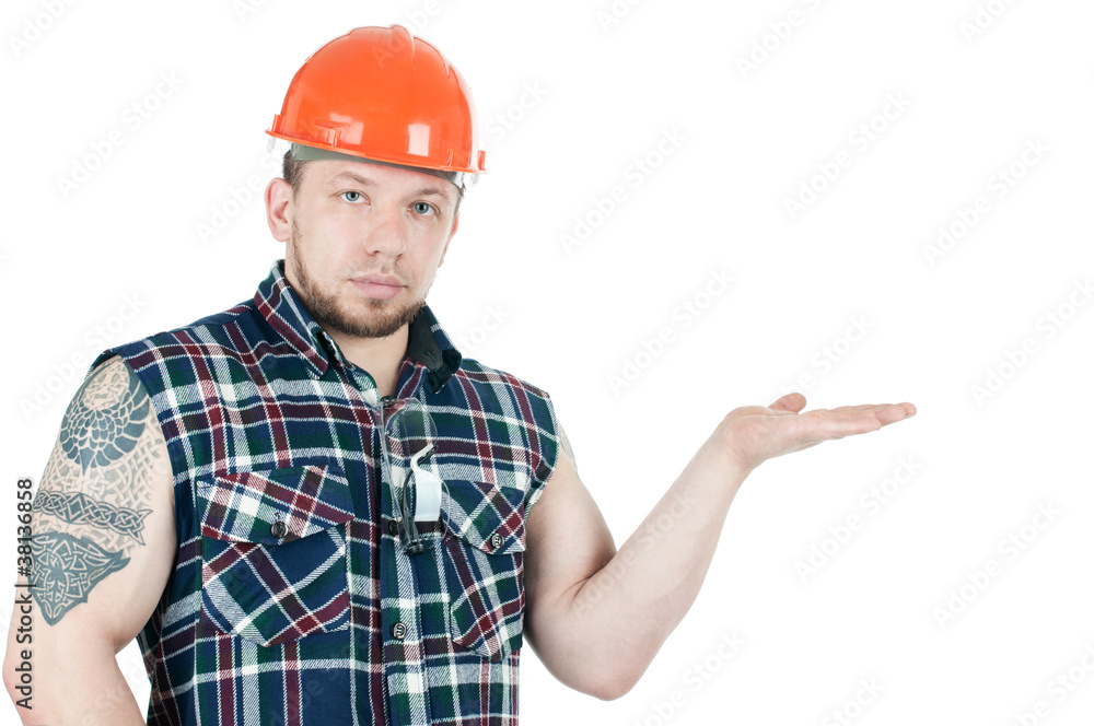 Confident building contractor pointing to copyspace Confident building contractor pointing to copyspace