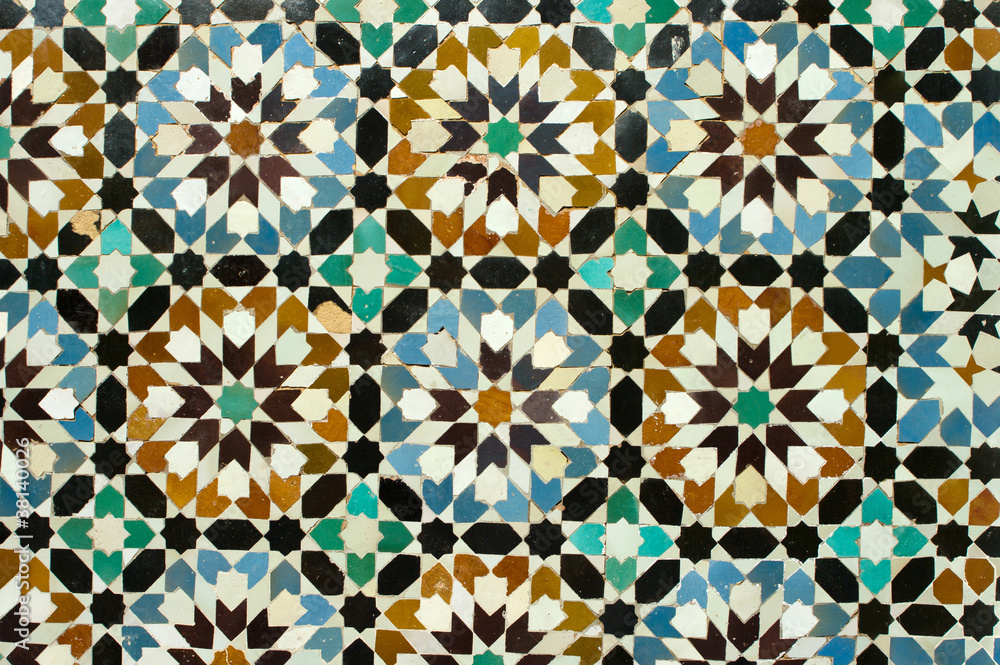 Traditional ornament on the wall of Ben Youssef Medersa, Morocco Traditional ornament on the wall of Ben Youssef Medersa, Morocco