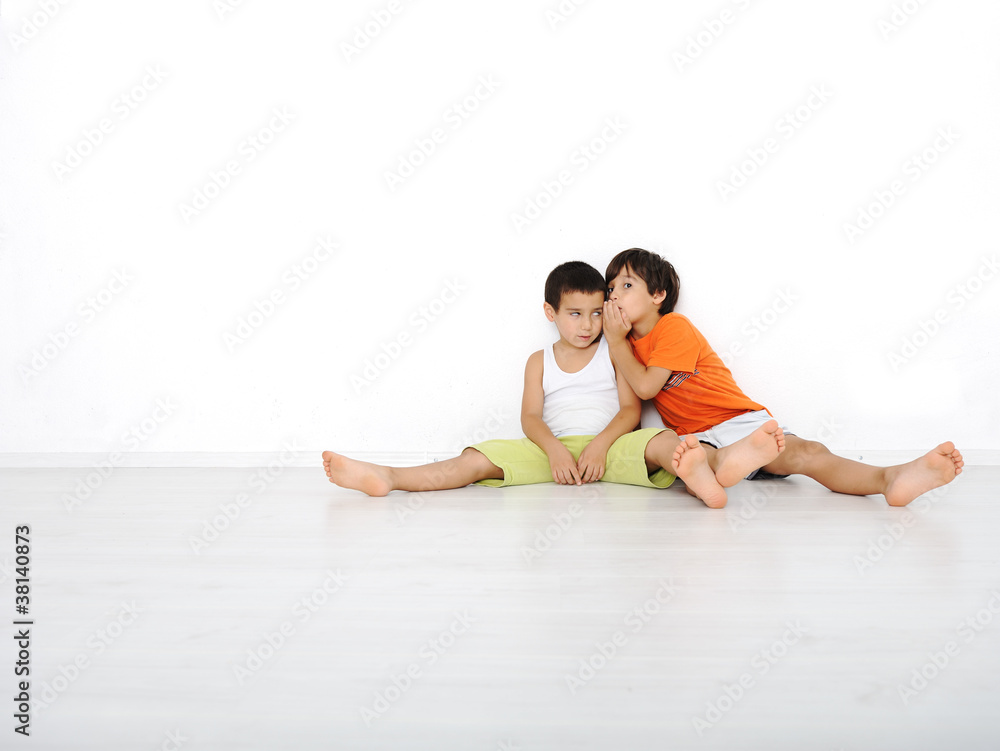 Happy children sitting at home, indoor Happy children sitting at home, indoor