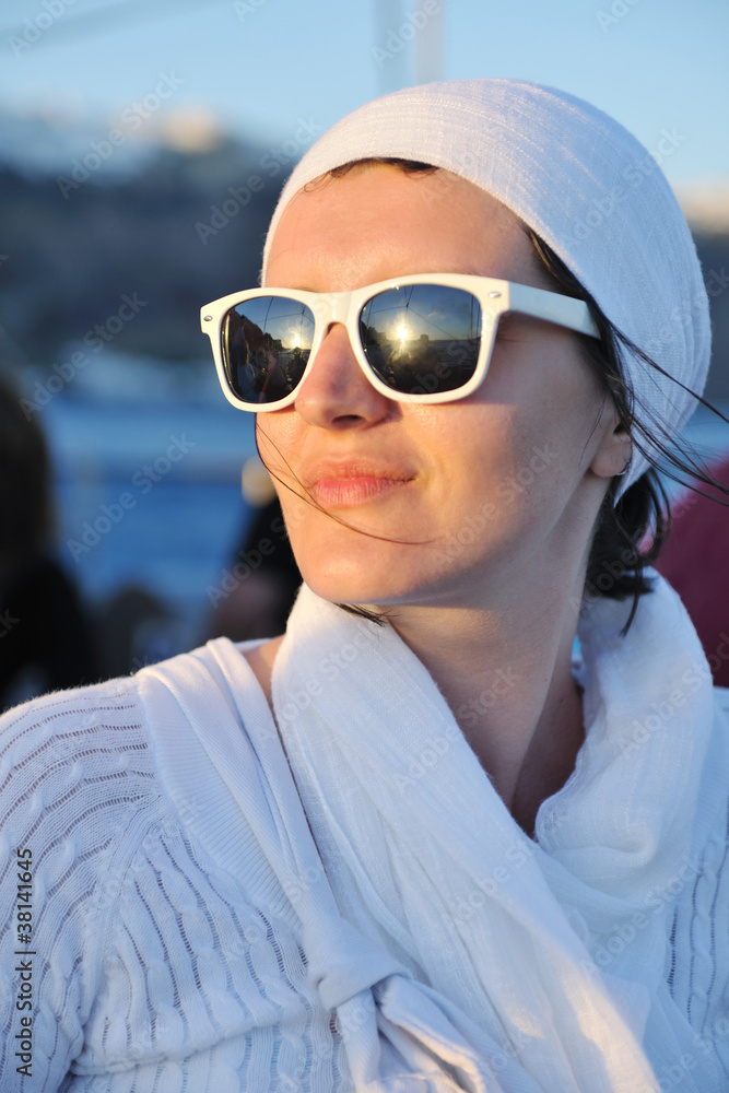 Greek woman on the streets of Oia, Santorini, Greece Greek woman on the streets of Oia, Santorini, Greece