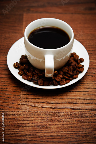 cup of coffee on a wooden table