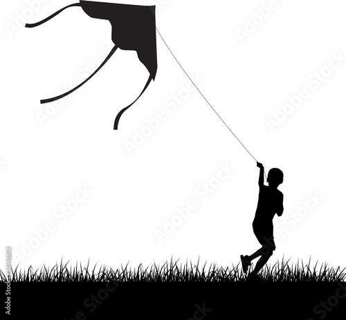 silhuette of running boy with flying kate.