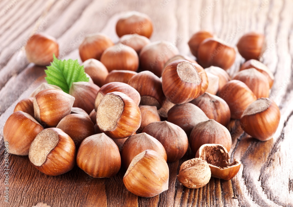 Filberts on a wooden table. Close-up shot. Filberts on a wooden table. Close-up shot.