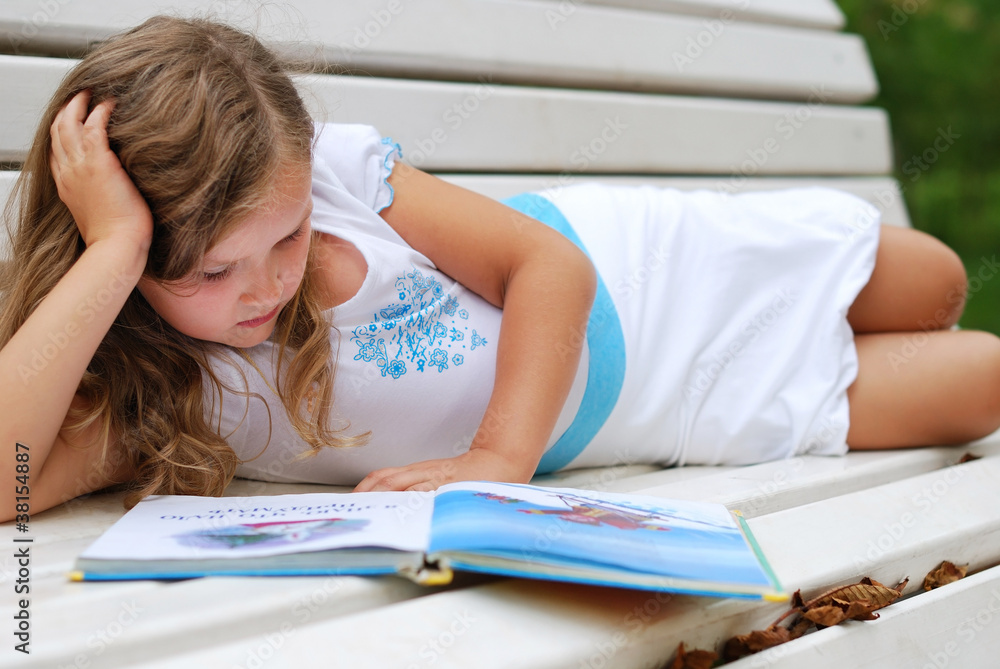 Portrait of the little girl with the book Portrait of the little girl with the book