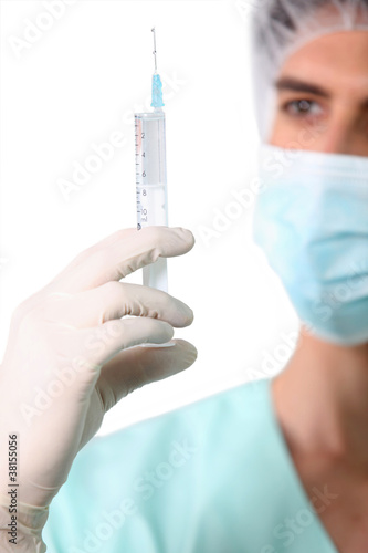 Nurse holding injection