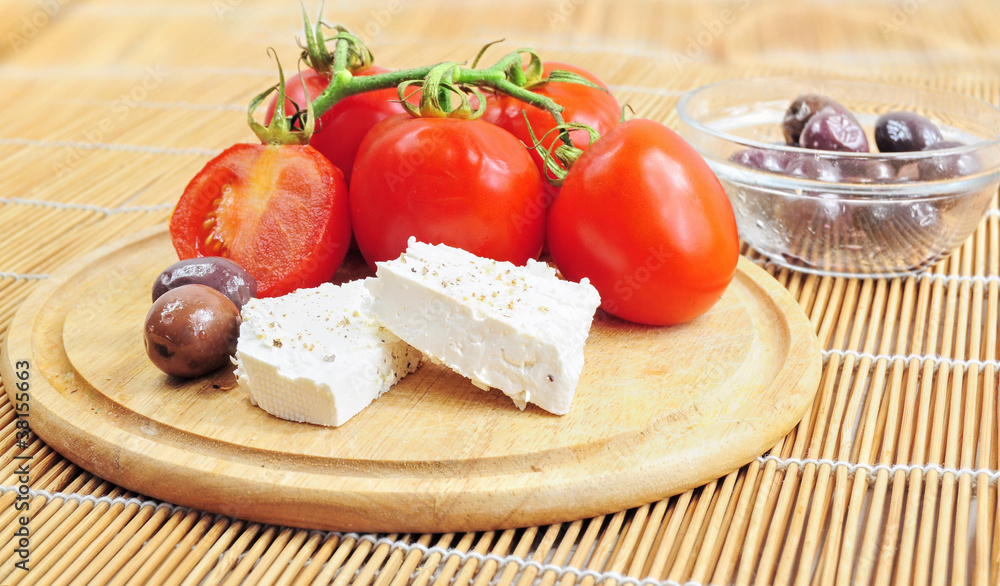Fresh tomatoes, olives and white cheese Fresh tomatoes, olives and white cheese