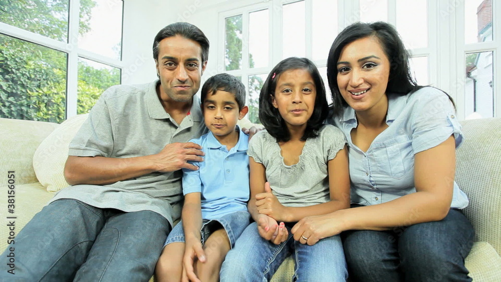 Asian Family Having Online Webchat at Home Asian Family Having Online Webchat at Home
