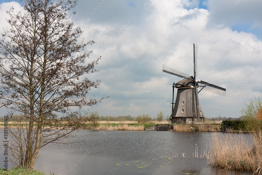 Beautiful traditional windmill in springtime, Kinderdijk, the Ne