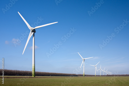 Windturbines in the farmland of Flevoland, the Netherlands