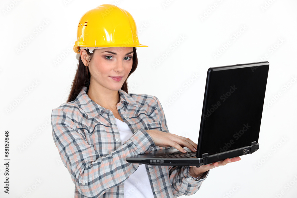 Female construction worker with laptop Female construction worker with laptop