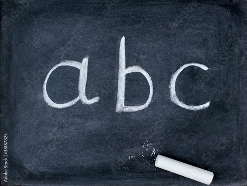 abc letters and chalk on blackboard