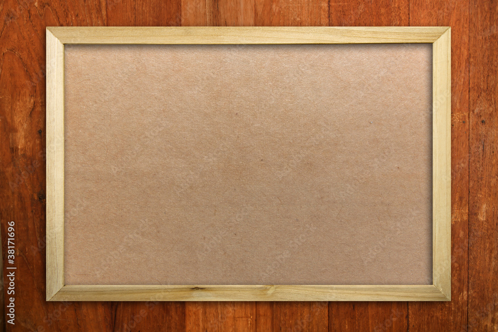 Fototapeta premium Wood picture frame on wood panel