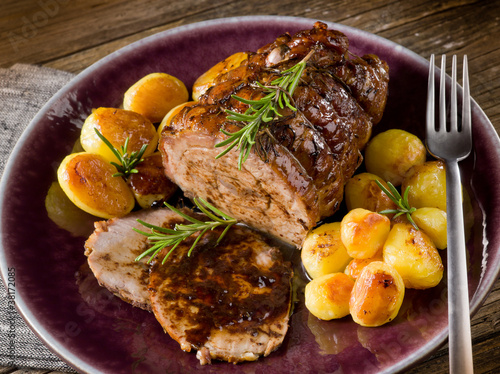 roast of veal with potatoes photo