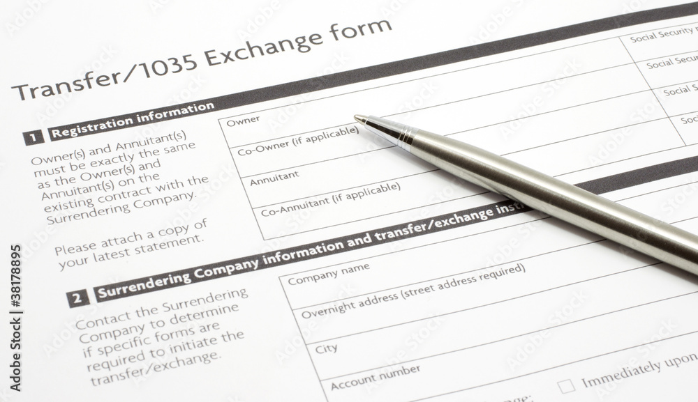 Section 1035 Exchange Paper Form with a Silver Pen Section 1035 Exchange Paper Form with a Silver Pen