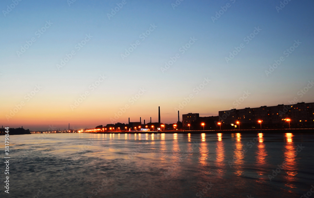 October embankment and Neva river after sunset