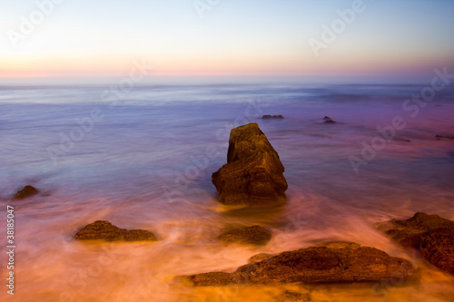 Sunset on the rocky coast in Portugal