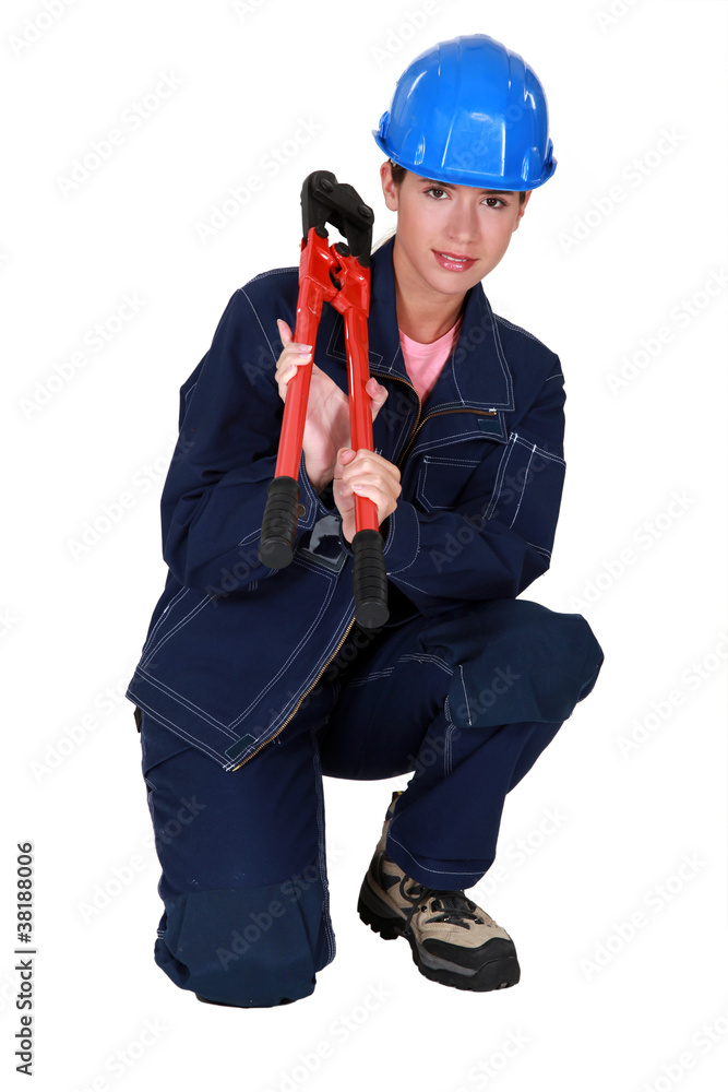 craftswoman holding a spanner craftswoman holding a spanner