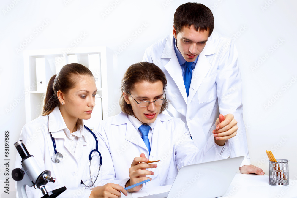 Young doctors at work Young doctors at work