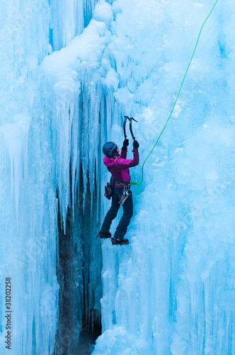 portrait of woman climbing ice photo