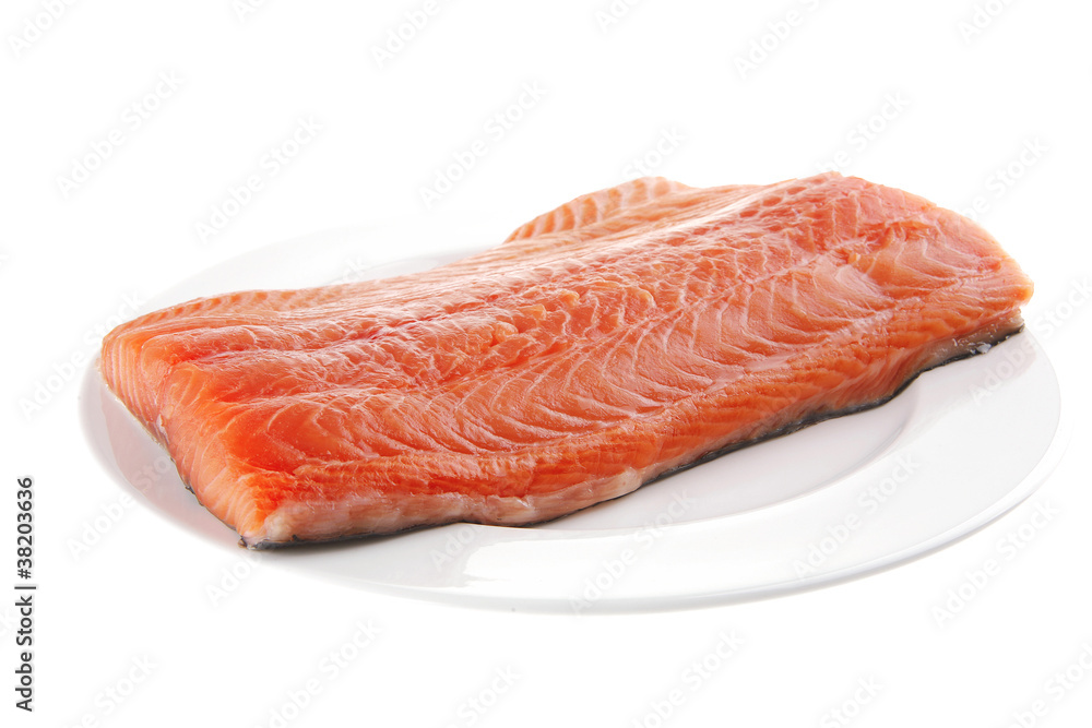 raw salmon fillet on white plate raw salmon fillet on white plate