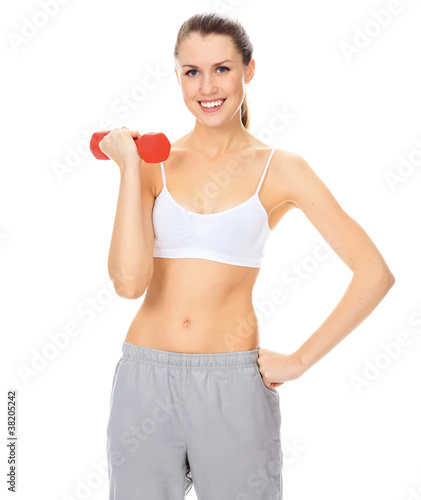 Pretty brunette girl with red barbell smiling to you