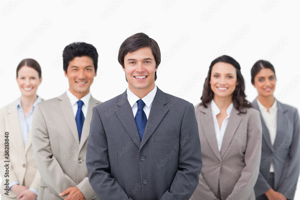 Smiling young salesteam standing Smiling young salesteam standing