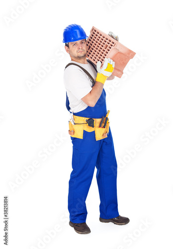 Worker carrying brick - isolated