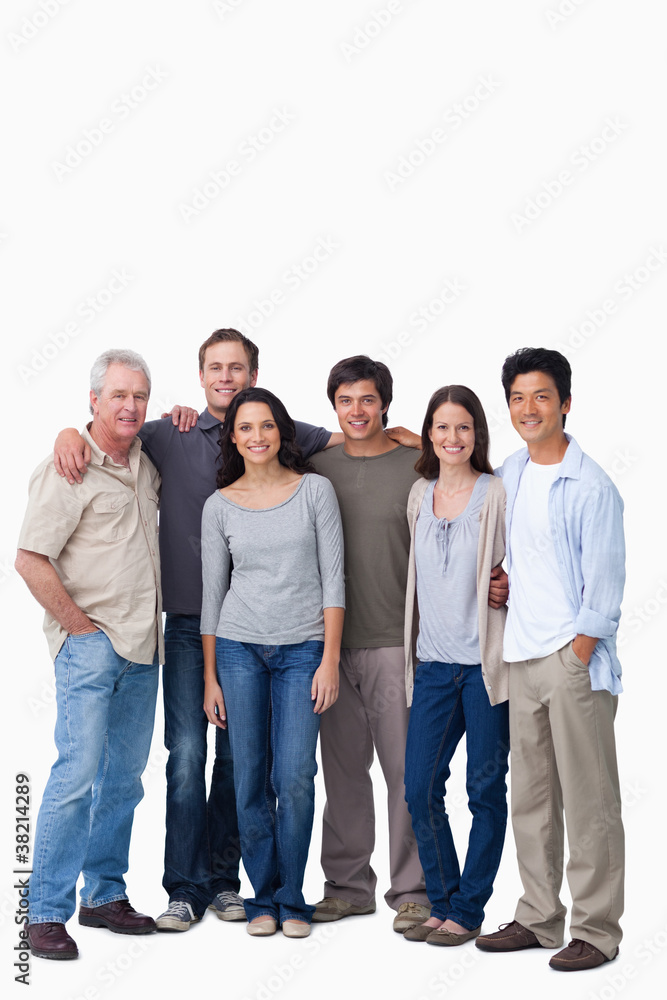 Smiling group of friends standing together Smiling group of friends standing together