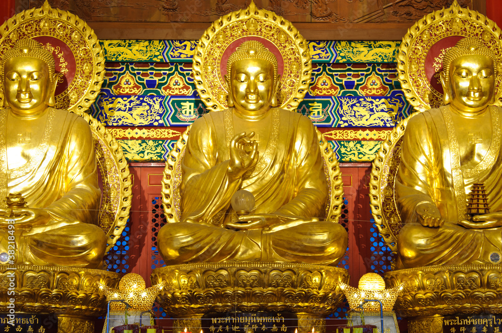 Three Golden Buddha Statue