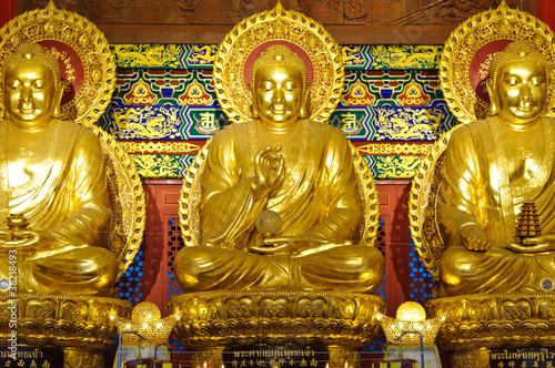 Three Golden Buddha Statue