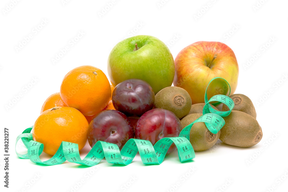 Fruits and measuring tape on white background Fruits and measuring tape on white background