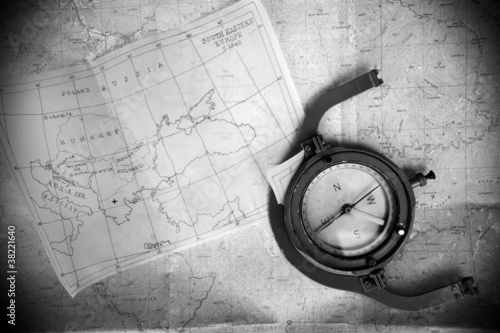 black and white maps and compass photo