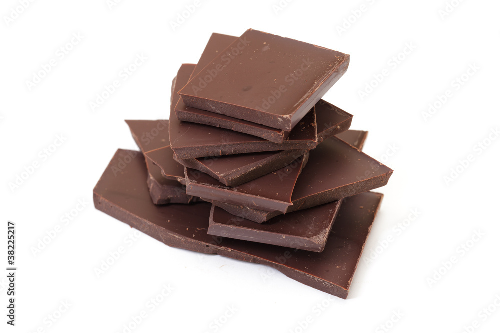 chocolate pieces on white background chocolate pieces on white background