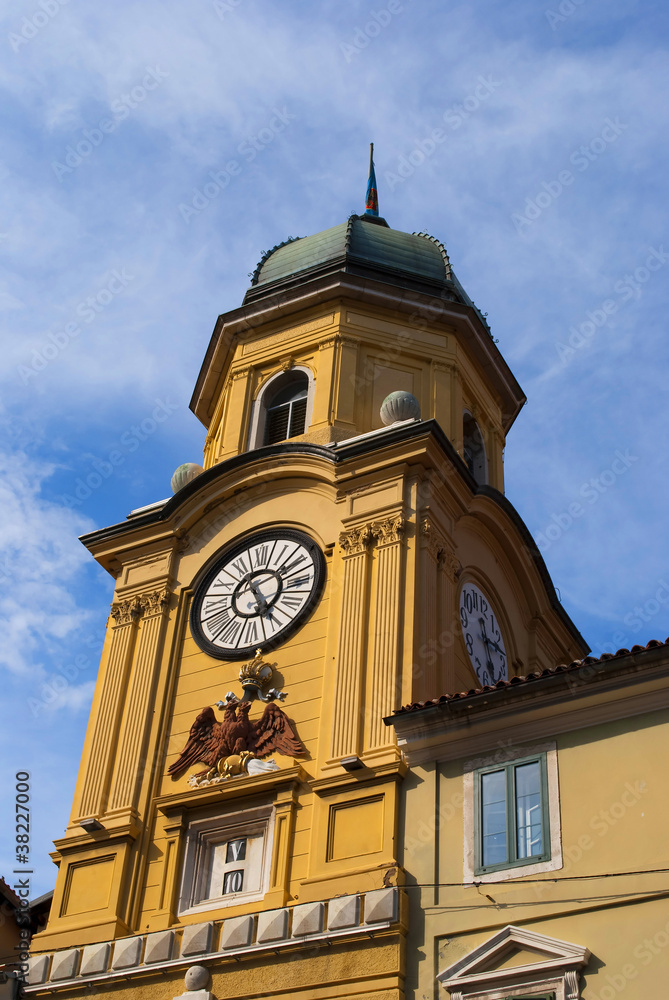 yellow clock tower in rijeka, croatia