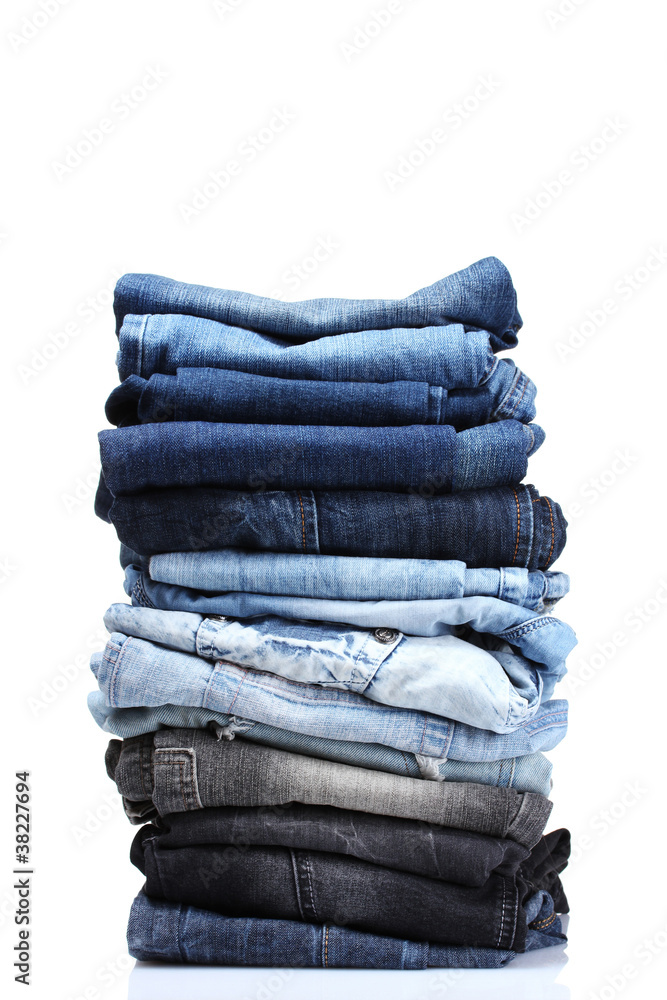 lot of blue jeans isolated on white lot of blue jeans isolated on white