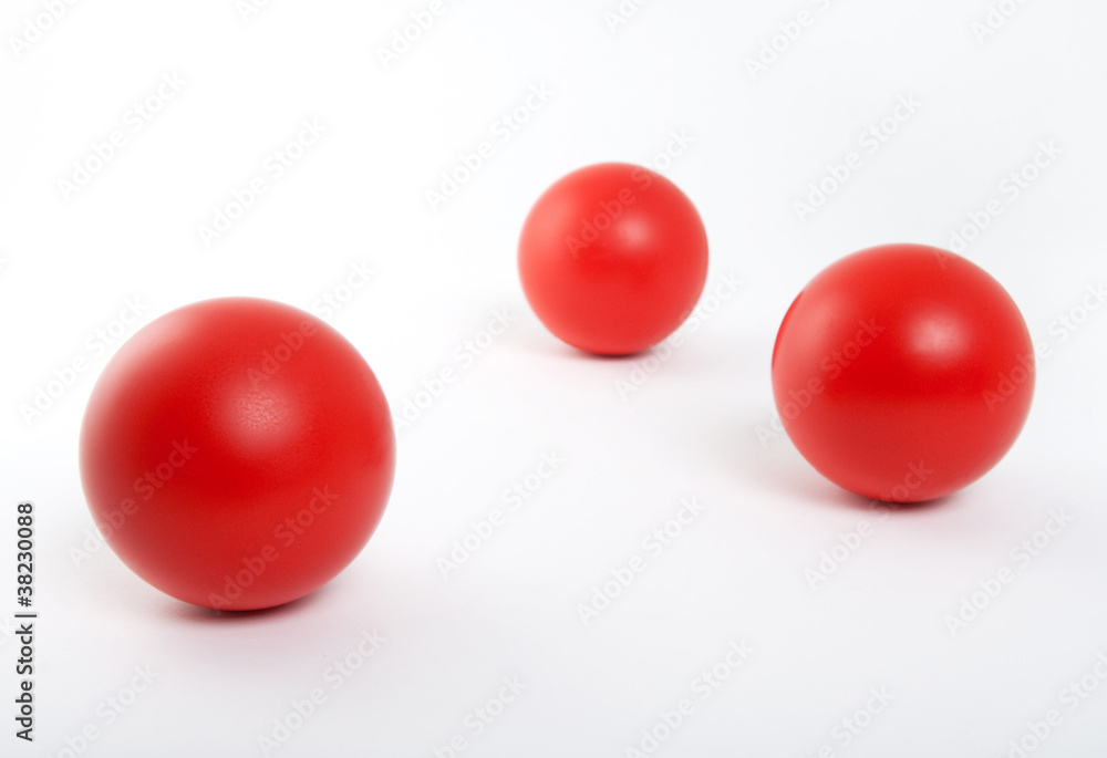 Red balls on white background Red balls on white background