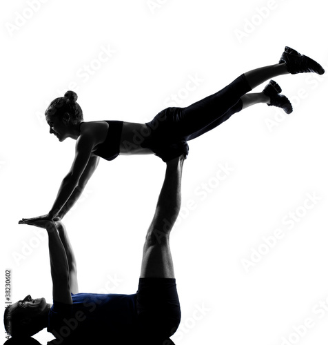 Fototapeta Naklejka Na Ścianę i Meble -  couple woman man exercising workout