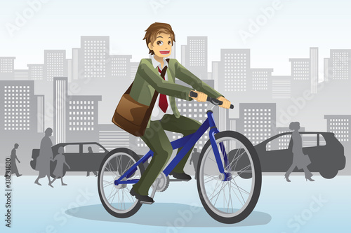 Fototapeta Naklejka Na Ścianę i Meble -  Businessman riding bicycle