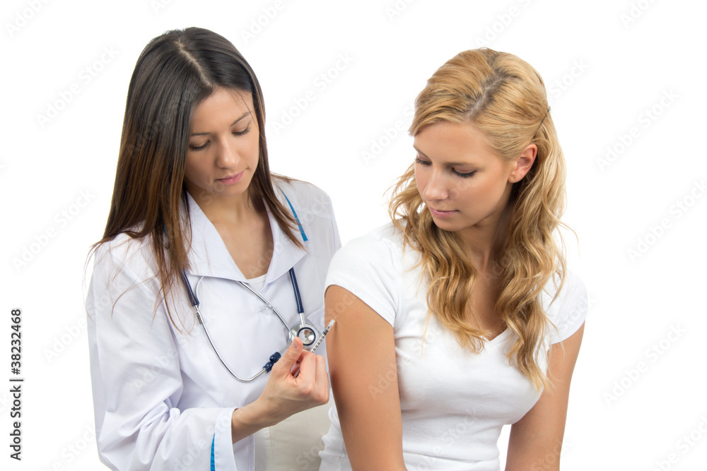 Doctor making insulin or flu vaccination shot by syringe Doctor making insulin or flu vaccination shot by syringe
