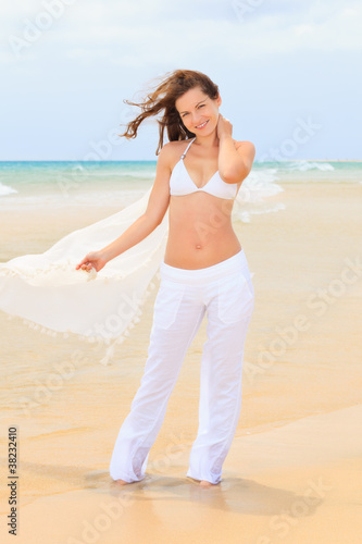 Young woman on ocean beach