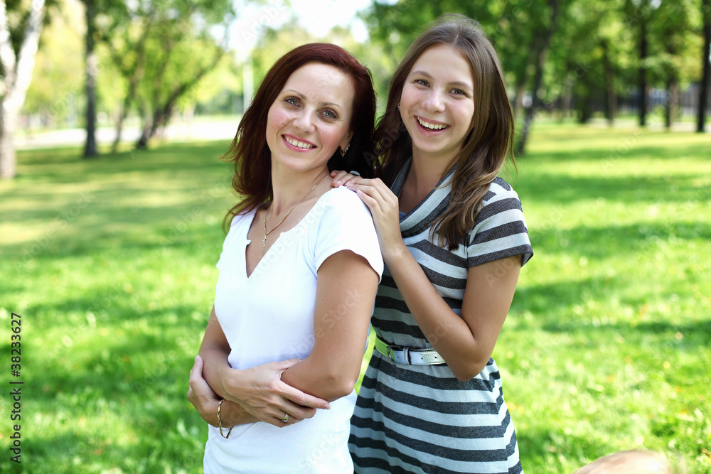Fototapeta premium Mother with her daughter in summer park