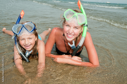 Summer vacation - snorkel girls at the beach