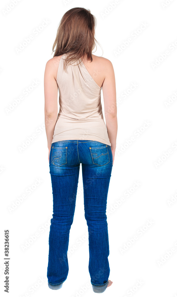 Back view of beautiful yong woman looks ahead. rear view Back view of beautiful yong woman looks ahead. rear view